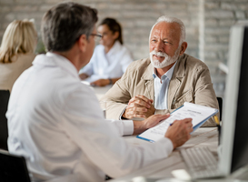 Normal_happy-mature-man-having-consultations-with-doctor-about-health-insurance-policy-meeting-clinic